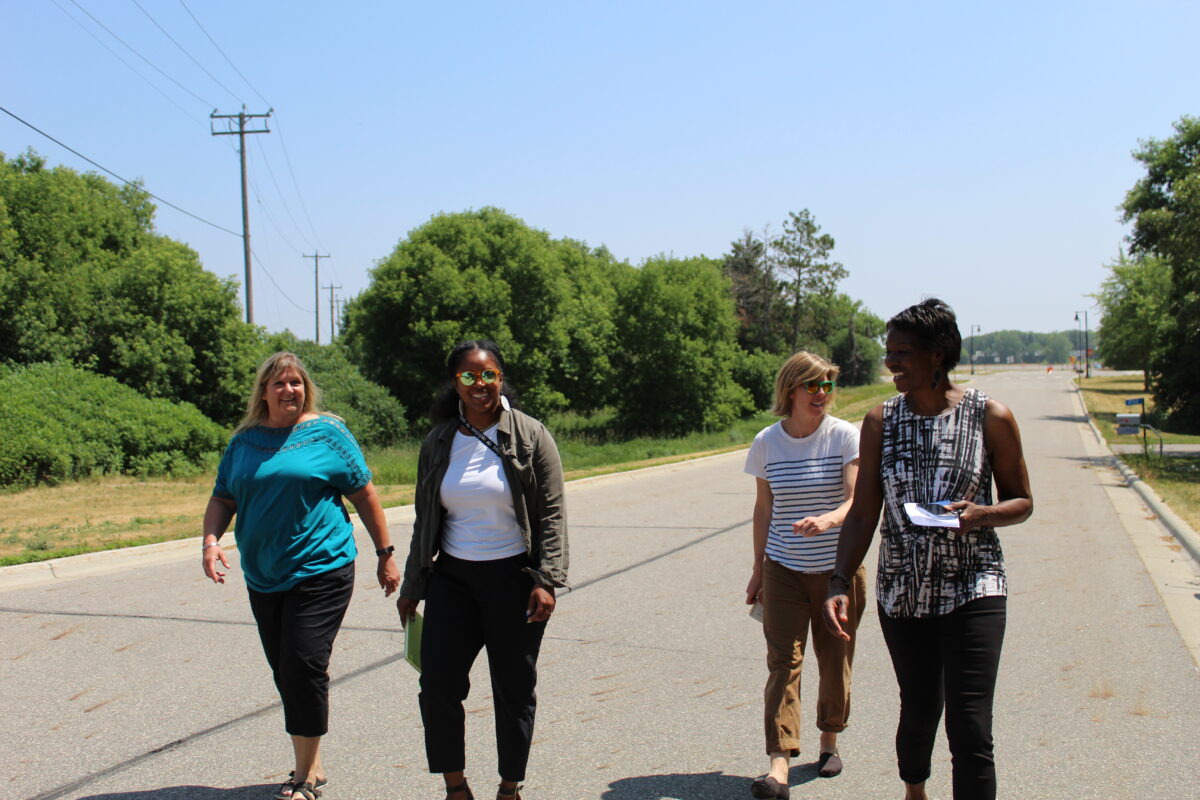 WFM staff and Terebinth staff walking down a road together