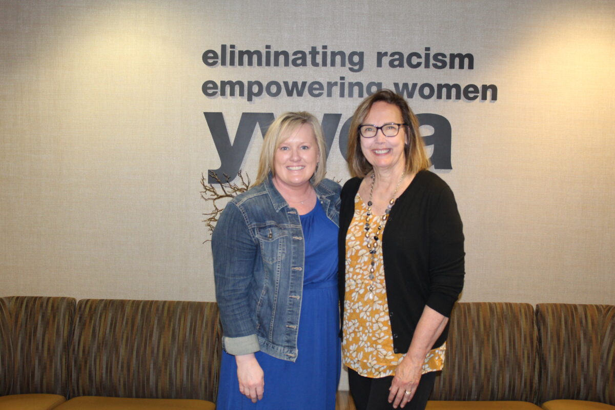 YWCA Cass Clay staff standing and smiling at the camera