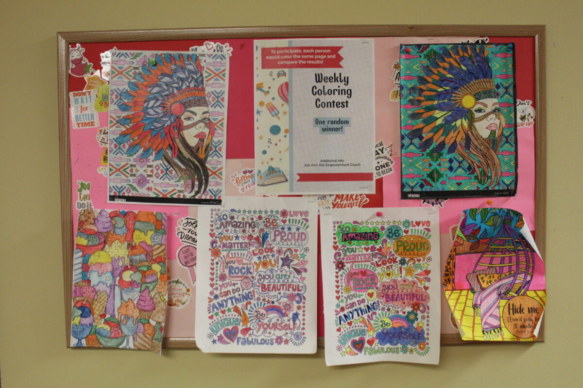 Coloring art posted on a board at YWCA