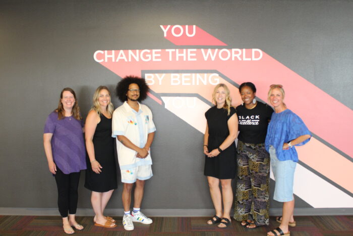 Photo of WFM staff with BIO Girls (beautiful inside and out)